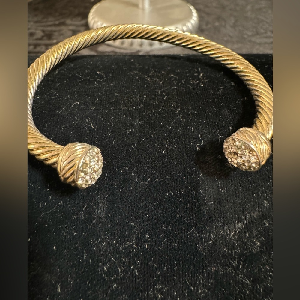 Gold tone bangle